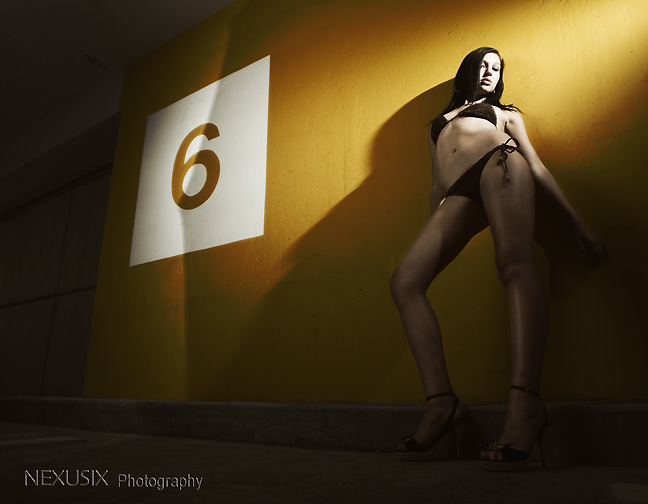 Female model photo shoot of Ashley Van Schoonhoven in Parking garage
