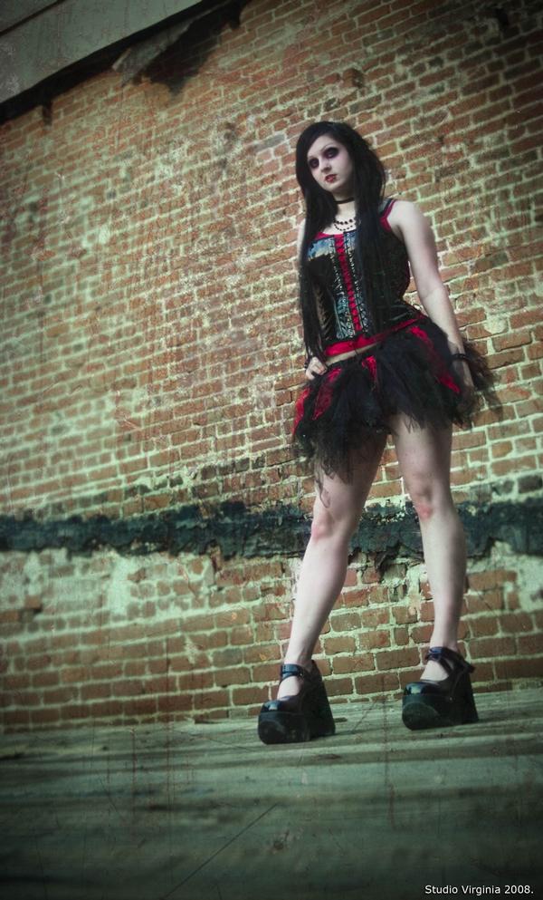 Female model photo shoot of BlOOd Barbie by Studio Virginia in Downtown Baton Rouge, clothing designed by MTcoffinz 