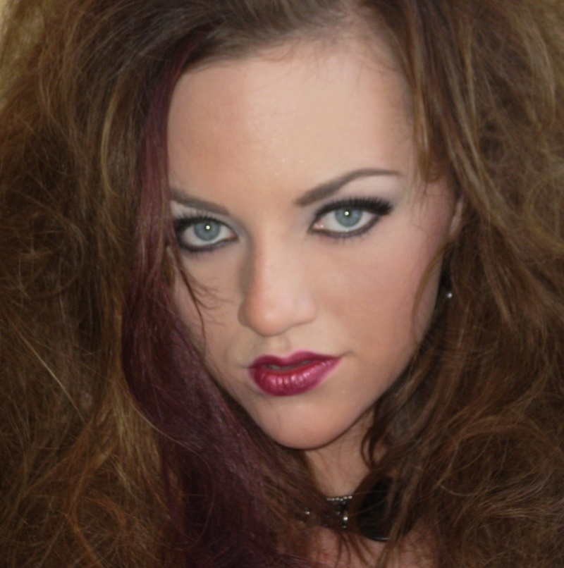 Female model photo shoot of Innovative Hair Designs