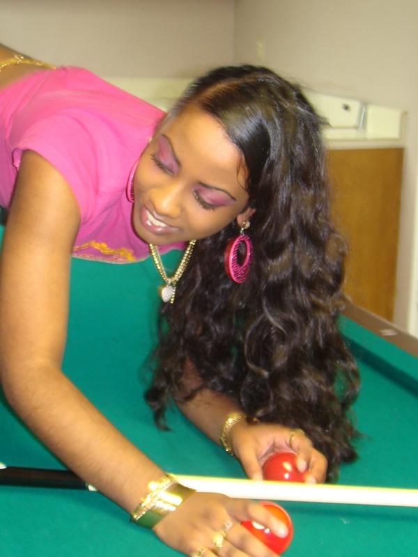 Female model photo shoot of Life Size Pocahontas in top of pool table