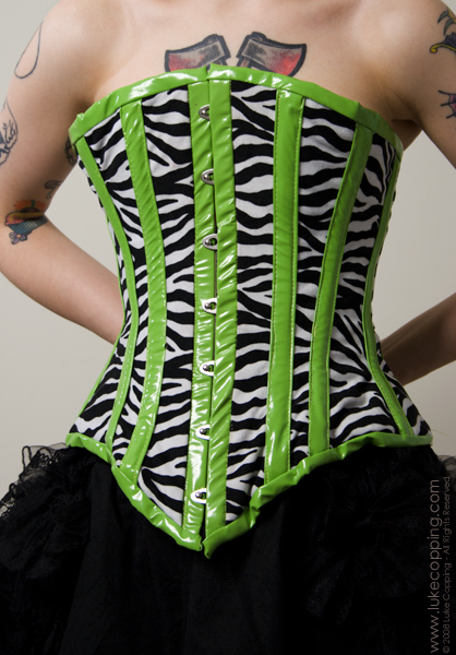 Female model photo shoot of 160 Proof Corsetry by Luke Copping, makeup by Rachel Mazzie
