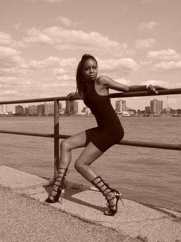 Female model photo shoot of Nacia in Detroit Riverfront