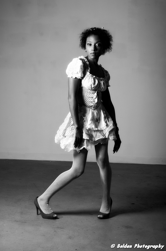 Female model photo shoot of DLisa VaShawn by Bolden Studio, makeup by KoCoBronzz