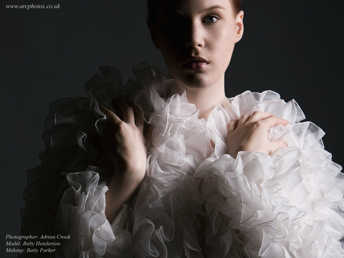 Female model photo shoot of Ruby Henderson by Adrian Crook in Arc Studios, makeup by SonaraParker