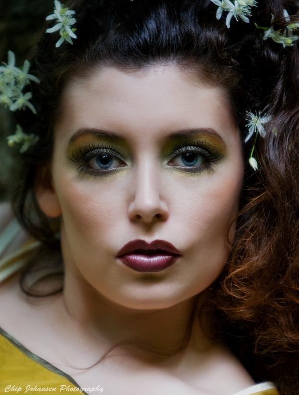 Female model photo shoot of Scarlett Adams makeup in old mill ruins