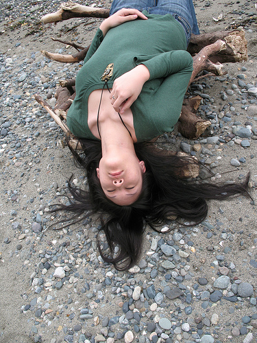 Female model photo shoot of astroluno in a beach