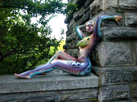 Female model photo shoot of Crystella Marie by Jack the Calico in The castle @ Central Park, body painted by Andy Golub