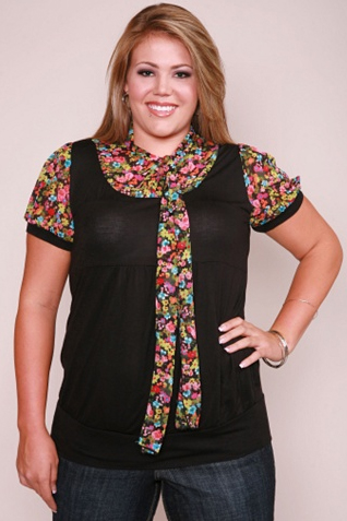 Female model photo shoot of Courtney Purtle in Torrid headquarters