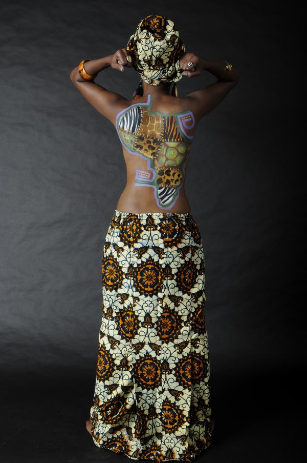 Female model photo shoot of naomi collins, body painted by AkaBodyart