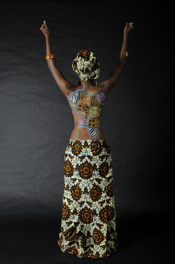 Female model photo shoot of naomi collins, body painted by AkaBodyart