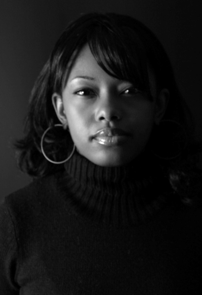 Female model photo shoot of Efia Savannah Taylor
