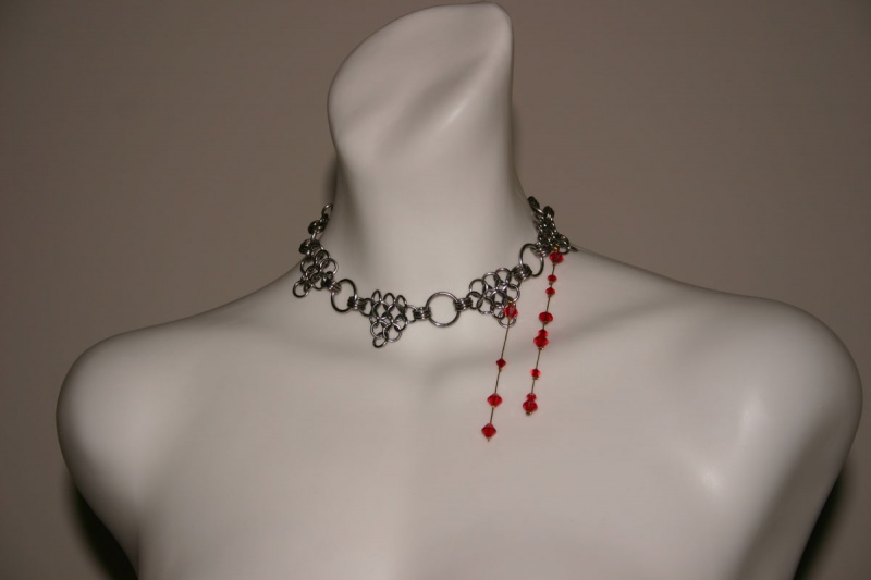 Male model photo shoot of Chainmail by Michael K in Just found an old shot I took of finished necklace.