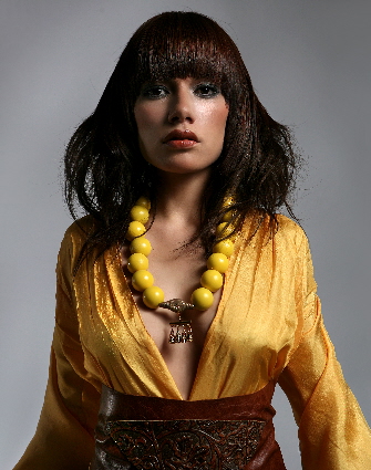 Female model photo shoot of Lunatic Fringe Salons