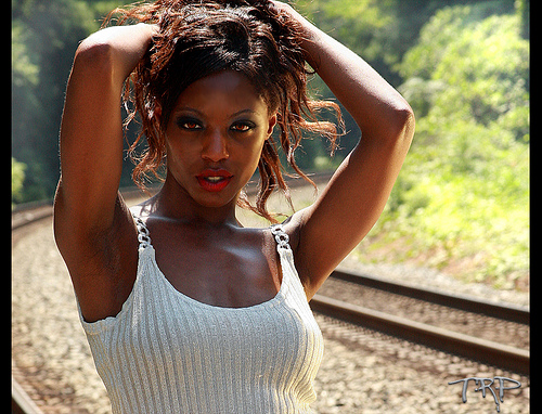 Female model photo shoot of Sonya Brownsuga by Tom Robbins Photography in Rail Road Tracks