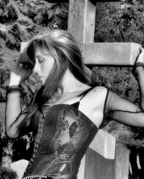 Female model photo shoot of Carrie Smyth by Helios LLC in cemetary
