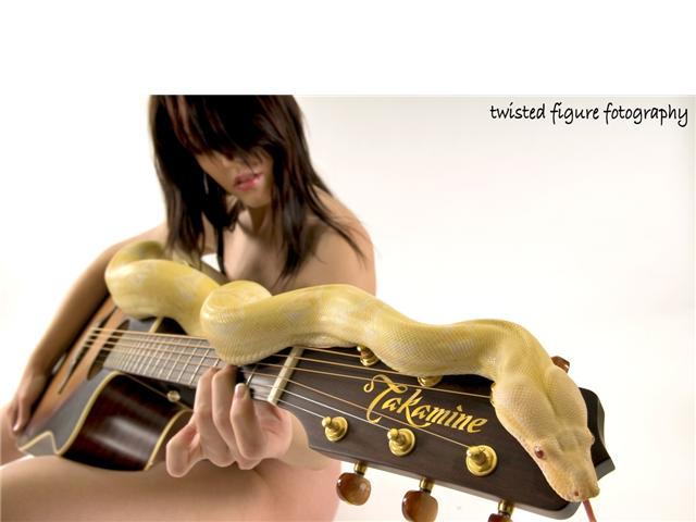 Female model photo shoot of Floyd Rose by twisted figure foto