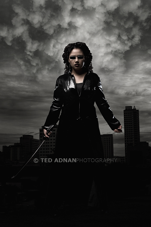 Female model photo shoot of Anitha T by Ted Adnan Photography, makeup by TarachinT Artistry