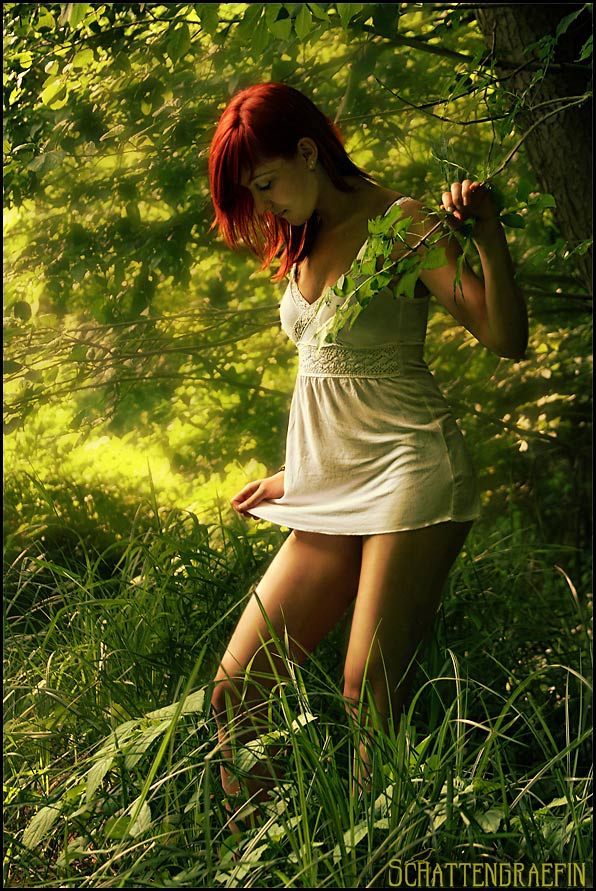 Female model photo shoot of Schattengraefin in wood
