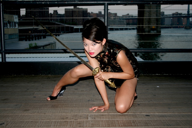 Female model photo shoot of Angelina Awesome by patt thomas in South Street Seaport, makeup by mako m