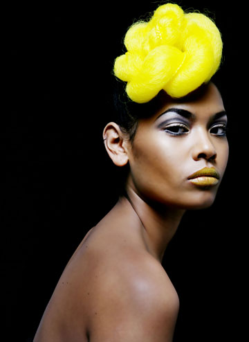Female model photo shoot of Lauraine Bailey Hair and amira rocks by Sheena Bose in London, makeup by Sam Lascelle