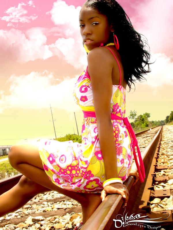 Female model photo shoot of Nae Shani in rail road tracks