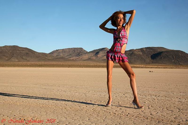 Female model photo shoot of KP the MoDeL by Nevada Fantasies in Dry Lake Bed~Jean, NV.