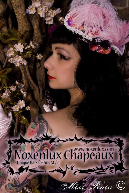 Female model photo shoot of Noxenlux Chapeaux
