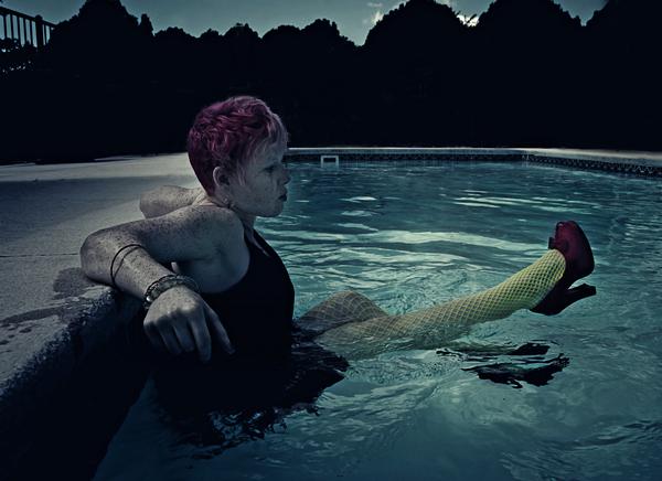 Female model photo shoot of Aliz Rouge in liv's pool