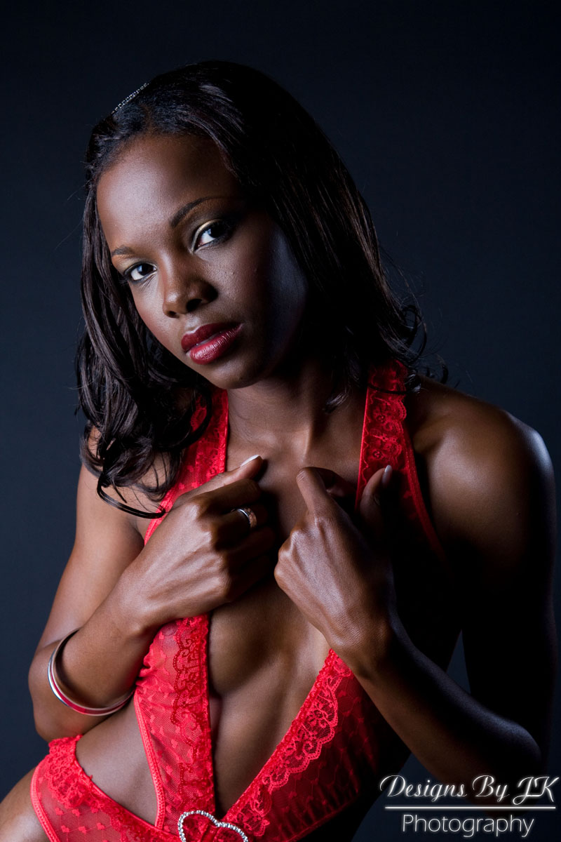 Female model photo shoot of Taketra Rena by Designs By JK in CHARLOTTE, NC, makeup by Blu Artistry