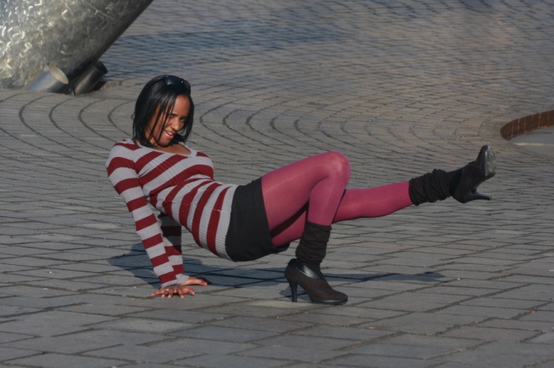 Female model photo shoot of Alicia Richel in Hart Plaza- Downtown Detroit