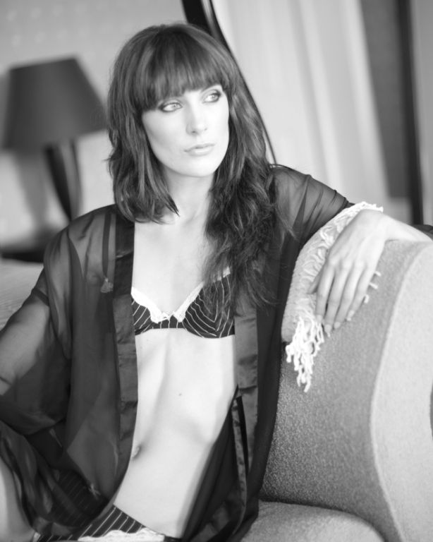 Female model photo shoot of Lisa Jayne in Seaham Hall penthouse suite