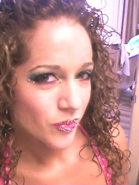 Female model photo shoot of Rouge Lipstick in Miami