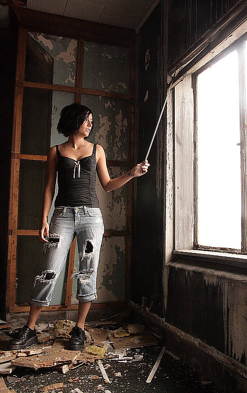 Female model photo shoot of leAnne in warehouse