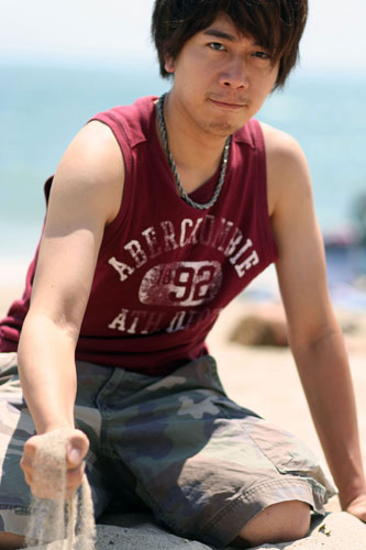 Male model photo shoot of ian rusli in santa monica beach