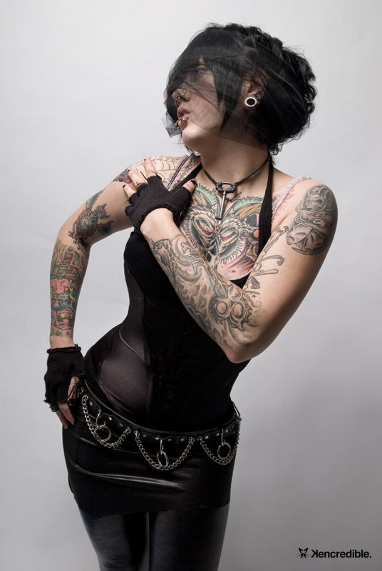 Female model photo shoot of Keycifer Black in Sub Octo Gallery, makeshift studio.