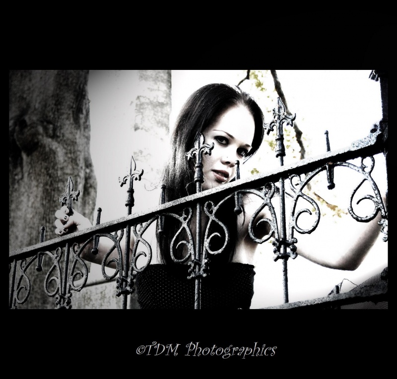 Female model photo shoot of Kristen Nash by TDM Photographics in OakWood Cemetary