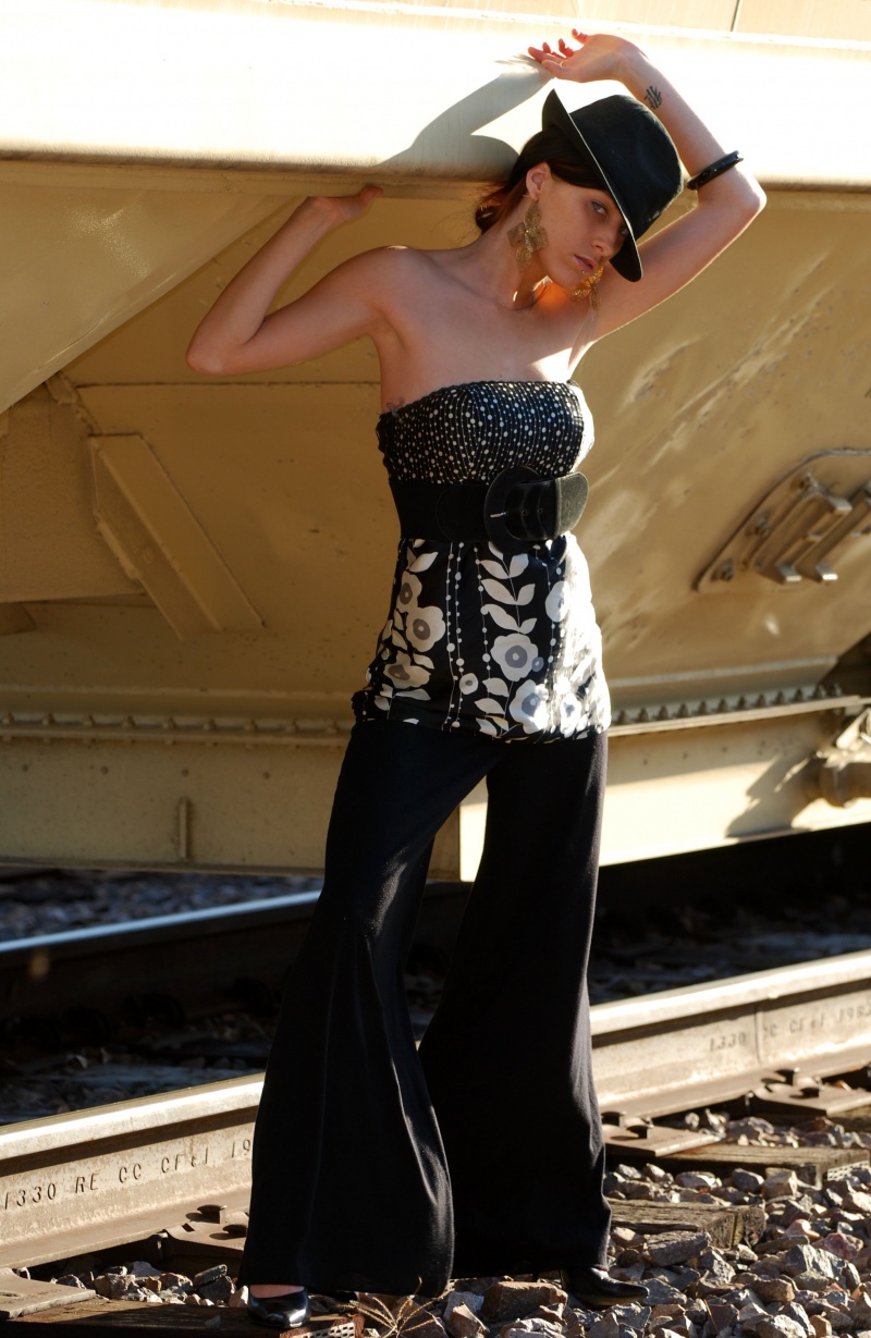 Female model photo shoot of Dollface Nikola  in Train Tracks 