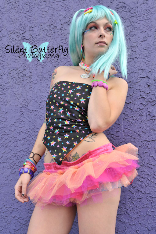 Female model photo shoot of Silent Butterfly and emyli dahlia in Denver, CO