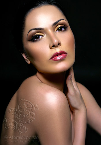 Female model photo shoot of Neeru Model by Atomik Photography - Umbar Shakir, makeup by Angela Holthuis