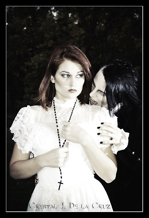 Female and Male model photo shoot of CoriLee and Michael Morbius by Luna Soledad in Durham Graveyard, makeup by Lollycat