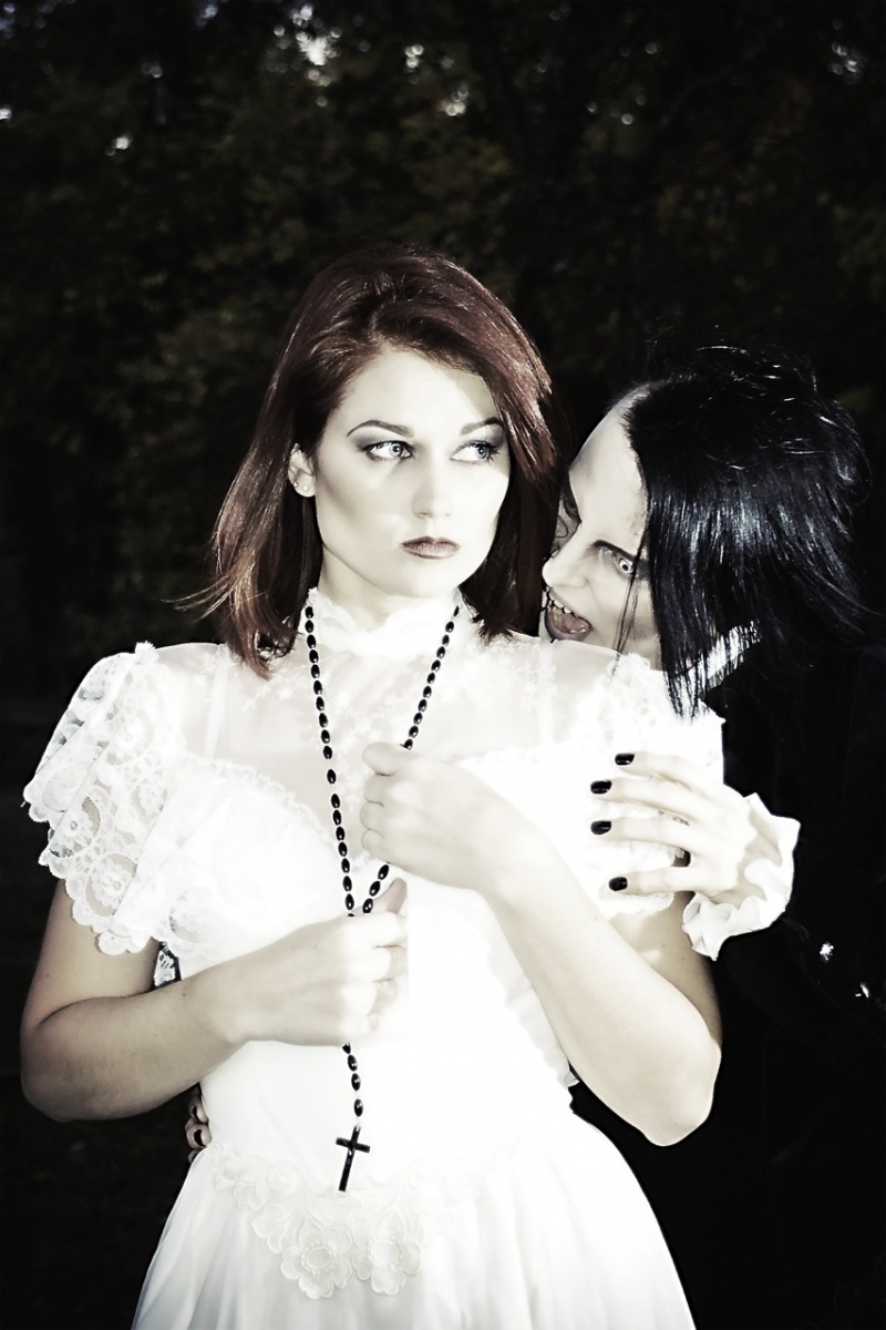 Female model photo shoot of Lollycat and CoriLee by Luna Soledad in Maplewood Cemetary, Durham, NC, makeup by Lollycat