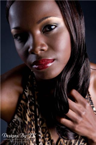 Female model photo shoot of Taketra Rena by Designs By JK in Charlotte, NC, makeup by Blu Artistry