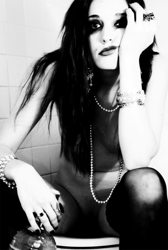 Female model photo shoot of Beatrice Bones by Under the Gun in Bathroom
