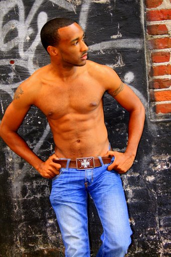 Male model photo shoot of Simuel by RiccRollinsPhotography in Alley