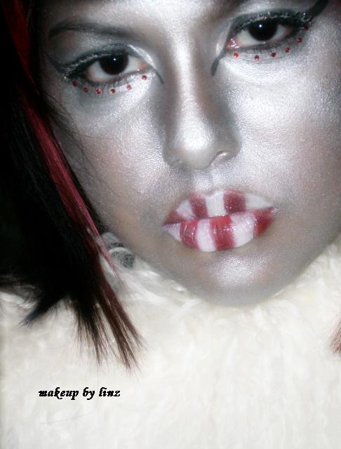 Female model photo shoot of Cyndi Frias, makeup by lbmakeup