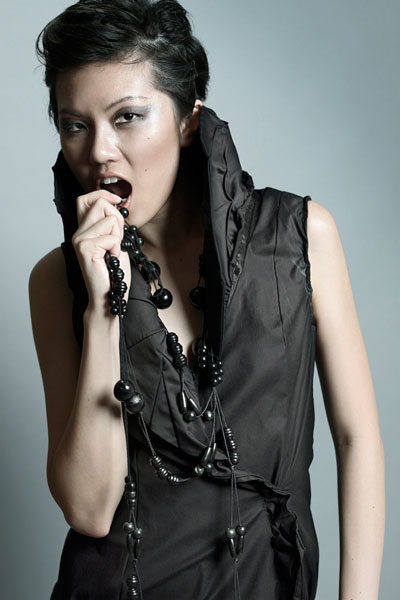 Female model photo shoot of Weng Yifei