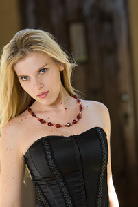 Female model photo shoot of MMC Jewelry in Orlando, Fl