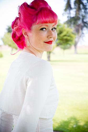 Female model photo shoot of Pink Pistol