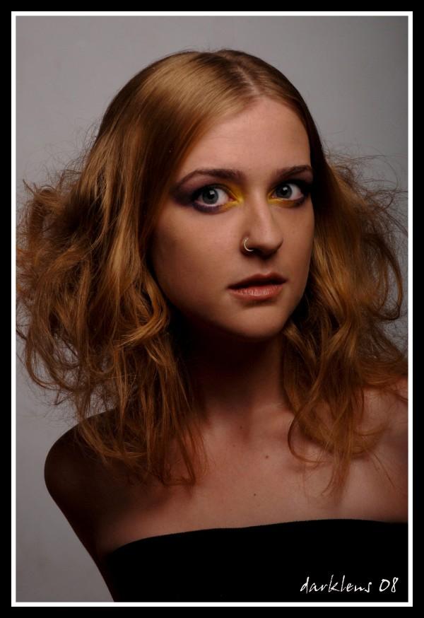 Female model photo shoot of Vicki Powell by Darklens in studio