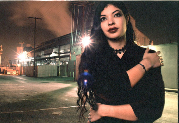 Female model photo shoot of Aja De Coudreaux in a stinky parking lot in LA